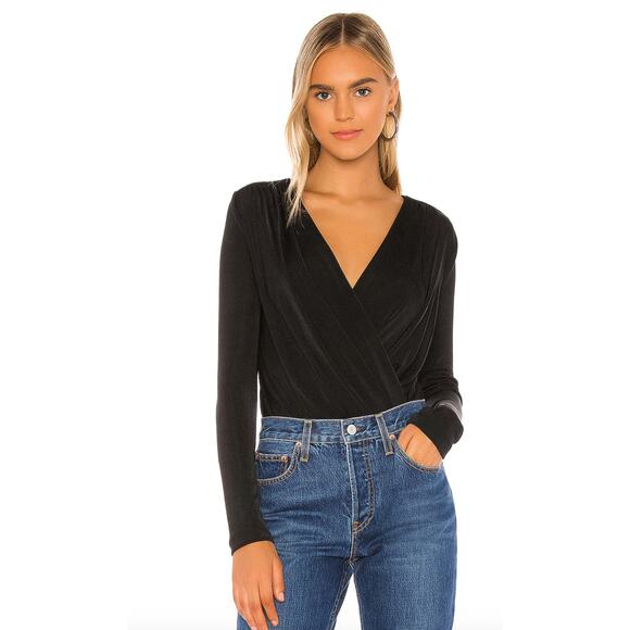 Free People Tops - New with tags Free People Turnt Thong Bodysuit SZ XS in Black